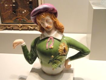 James Hadley's <i>Aesthetic Movement Teapot</i> (<i>Oscar Wilde Teapot</i>) (1882) parodied the ideas of Art for Art's Sake.